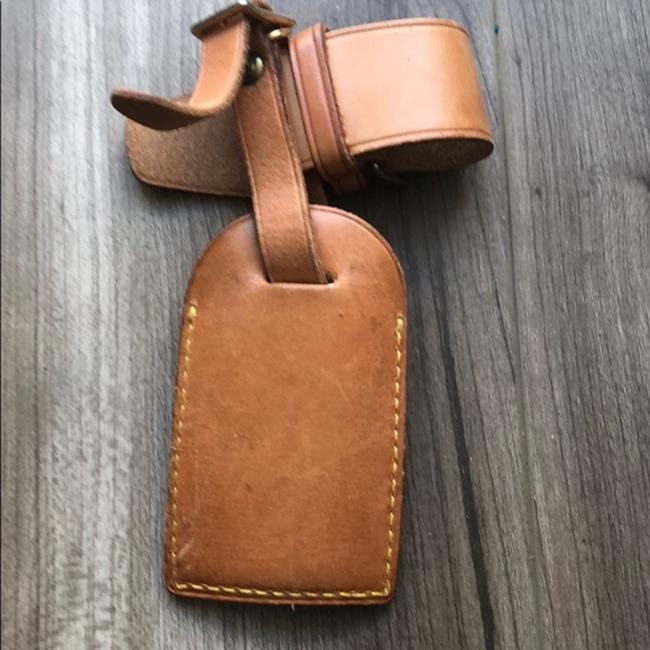 Louis Vuitton tag de equipaje 2- mostrador con defectos