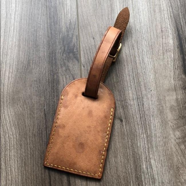 Louis Vuitton tag de equipaje - mostrador con defectos