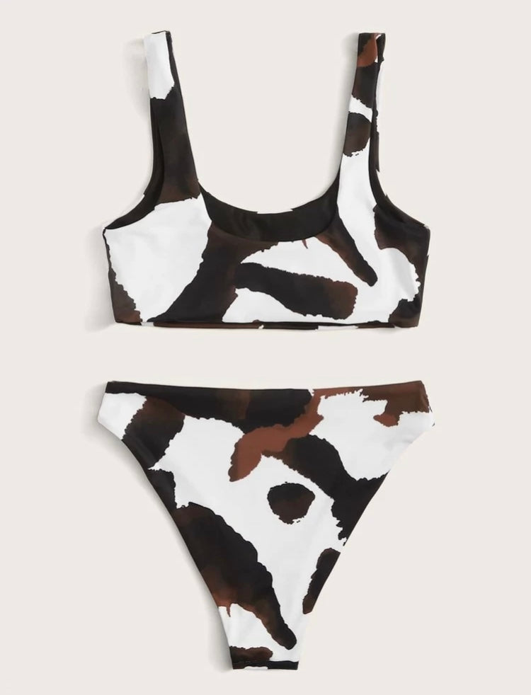 Bikini con talle algo estampado vaca negro con blanco y café