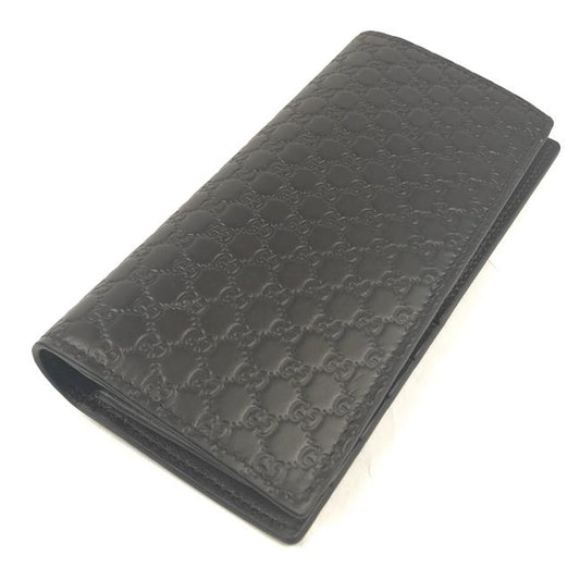Gucci cartera logo piel negra/café  - boutique