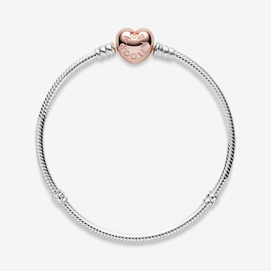 Pulsera Pandora corazón oro rosa