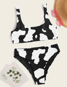 Bikini con talle algo estampado vaca negro con blanco